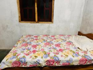 Ένα ή περισσότερα κρεβάτια σε δωμάτιο στο SriUK Homestay by Three Cs +7 φωτογραφίες