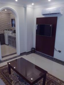 A kitchen or kitchenette at شقق برج نوران للشقق المخدومة