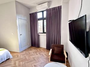 TV o dispositivi per l'intrattenimento presso 希沐溫泉行旅