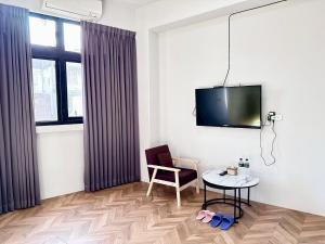 TV o dispositivi per l'intrattenimento presso 希沐溫泉行旅