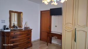 TV a/nebo společenská místnost v ubytování Bed and Breakfast La Reale