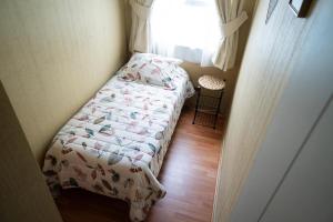 Postel nebo postele na pokoji v ubytování Viña Center Apartment Rodoviario Quinta Vergara + 9 fotografií