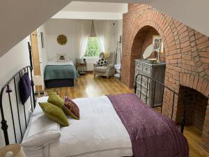Ένα ή περισσότερα κρεβάτια σε δωμάτιο στο True Colours Apartment in Central Location