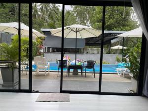 Φωτογραφία από το άλμπουμ του มาพูลวิลล่าขนอม MA Pool Villa Khanom σε Ban Nua Tha