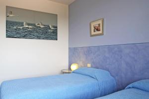 Ένα ή περισσότερα κρεβάτια σε δωμάτιο στο Villa Maura Toscana +18 φωτογραφίες