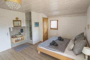 Posteľ alebo postele v izbe v ubytovaní Haus zum schlafenden Riesen