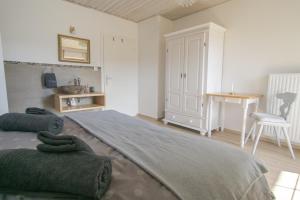 Posteľ alebo postele v izbe v ubytovaní Haus zum schlafenden Riesen