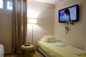 En eller flere senger på et rom på Villa Loop Beograd
