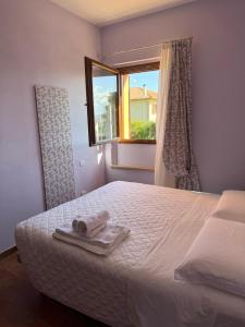 Posteľ alebo postele v izbe v ubytovaní Agriturismo Maloura