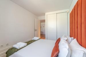 Postel nebo postele na pokoji v ubytování Topazio Apartment by Porto Stories