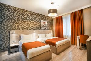 Letto o letti in una camera di 1 Hotel Borjomi