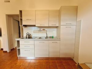 Kuchyňa alebo kuchynka v ubytovaní Caletta Apartments