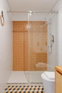 Koupelna v ubytování Topazio Apartment by Porto Stories + 31 fotografií