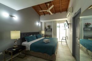 Postel nebo postele na pokoji v ubytování Hotel Boutique Casa Mar