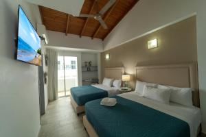 Postel nebo postele na pokoji v ubytování Hotel Boutique Casa Mar