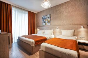 Letto o letti in una camera di 1 Hotel Borjomi