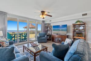 a living room with a view of the ocean at Romar Tower Unit 1A in Orange Beach +41 photos