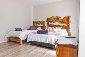 Postel nebo postele na pokoji v ubytování Casa Hotel Alicia Filandia