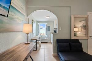 a living room with a table and a couch at Beachview Unit 321 in Gulf Shores