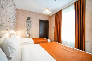 Letto o letti in una camera di 1 Hotel Borjomi