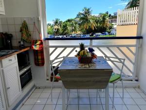 Dapur atau dapur kecil di Duplex 2 minutes de la plage