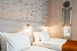 Letto o letti in una camera di 1 Hotel Borjomi