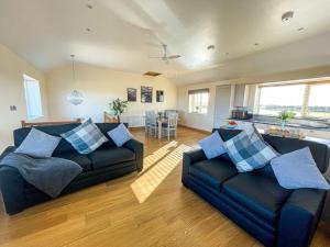 Et opholdsområde på Branwen Holiday Cottage