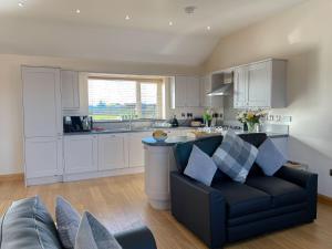 Køkken eller tekøkken på Branwen Holiday Cottage