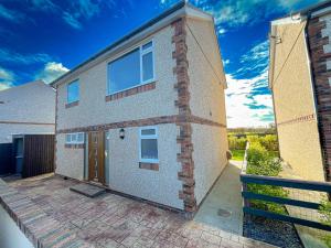 Bygningen som feriehuset ligger i