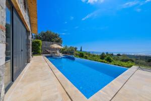 Πισίνα στο ή κοντά στο Villa Defnem