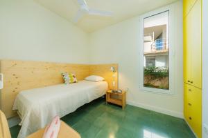 Una cama o camas en una habitación de Villa Mercedes 23 fotos más