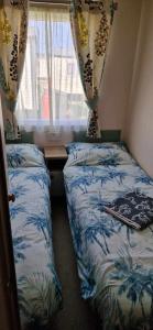Postel nebo postele na pokoji v ubytování Agnes Place