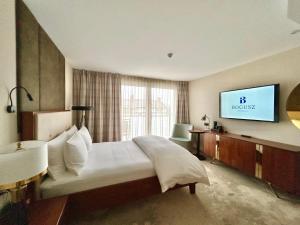 Ένα ή περισσότερα κρεβάτια σε δωμάτιο στο The BOGUSZ Wladyslawowo