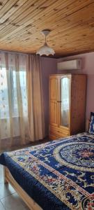 Postel nebo postele na pokoji v ubytování Guest House Paskal