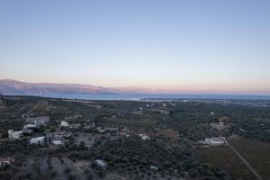 an aerial view of a city and a lake at Amara Haven in Aígio