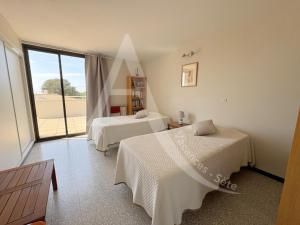 Postel nebo postele na pokoji v ubytování MAISON 3 CHAMBRES MONT SAINT CLAIR