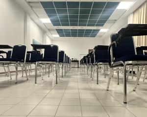 a row of empty chairs in a waiting room at Hotel St Gregory Park in Rimini +37 photos