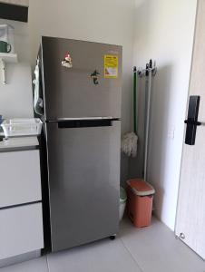 Kuchyň nebo kuchyňský kout v ubytování Lindo apto con vista al mar Santa Marta