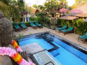 Bazén v ubytování Taruna Boutique Homestay & Spa nebo v jeho okolí