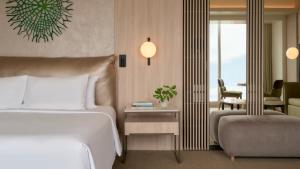 Cama ou camas em um quarto em Vignette Collection SOUMA Hotel by IHG
