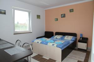 Posteľ alebo postele v izbe v ubytovaní Lorens Family + 13 fotografií