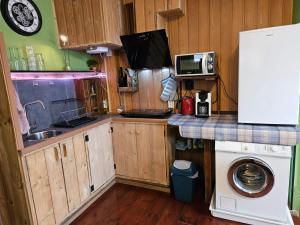 Køkken eller tekøkken på Vakantiehuisje van Orten