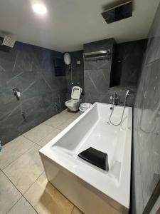 Koupelna v ubytování Hotel Shyam Paradise