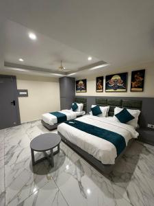 Postel nebo postele na pokoji v ubytování Hotel Shyam Paradise