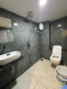 Koupelna v ubytování Hotel Shyam Paradise