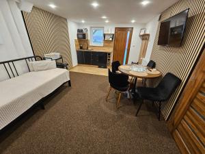 Postel nebo postele na pokoji v ubytování Apartmány Lenka Bešeňová 104