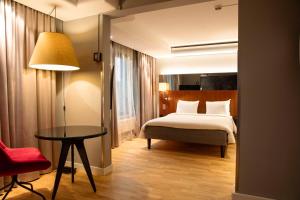 Łóżko lub łóżka w pokoju w obiekcie Radisson Blu Arlandia Hotel, Stockholm-Arlanda