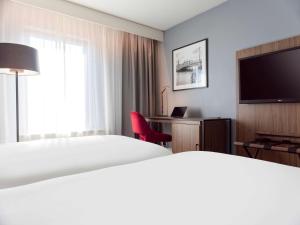 Telewizja i/lub zestaw kina domowego w obiekcie Radisson Blu Arlandia Hotel, Stockholm-Arlanda