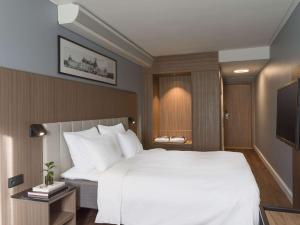 Łóżko lub łóżka w pokoju w obiekcie Radisson Blu Arlandia Hotel, Stockholm-Arlanda