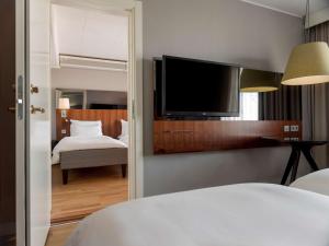 Łóżko lub łóżka w pokoju w obiekcie Radisson Blu Arlandia Hotel, Stockholm-Arlanda